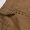 Pantaloncini con rinforzo su un solo ginocchio Pantaloncini con rinforzo su un solo ginocchio