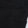 Pantaloncini con rinforzo su un solo ginocchio Pantaloncini con rinforzo su un solo ginocchio