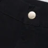 Pantaloncini con rinforzo su un solo ginocchio Pantaloncini con rinforzo su un solo ginocchio